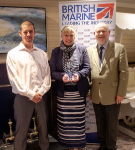 Deputy Harbour Master Adam Lewis, Harbour Master Wendy Stowe and Managing Director Russell Bowman proudly display the TYHA award.
