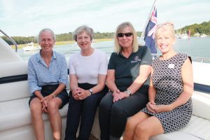 l-r Mary Montagu-Scott, Theresa May, Harbour Master Wendy Stowe and Buckler's Hard Manager Jane Yapp on the Beaulieu River