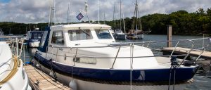 Beaulieu River and Buckler's Hard Yacht Harbour burgee flying on a boat