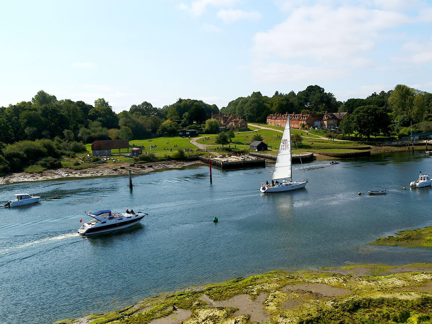 Boats on Beaulieu River sail past Buckler's Hard, 3.5 Nm from the Solent