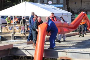Beaulieu River team members carrying out an oil spill exercise